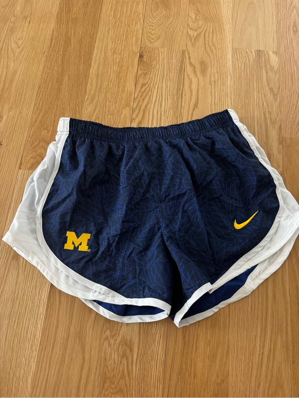 Nike Women's Navy Athletic Running Shorts with Yellow Logo